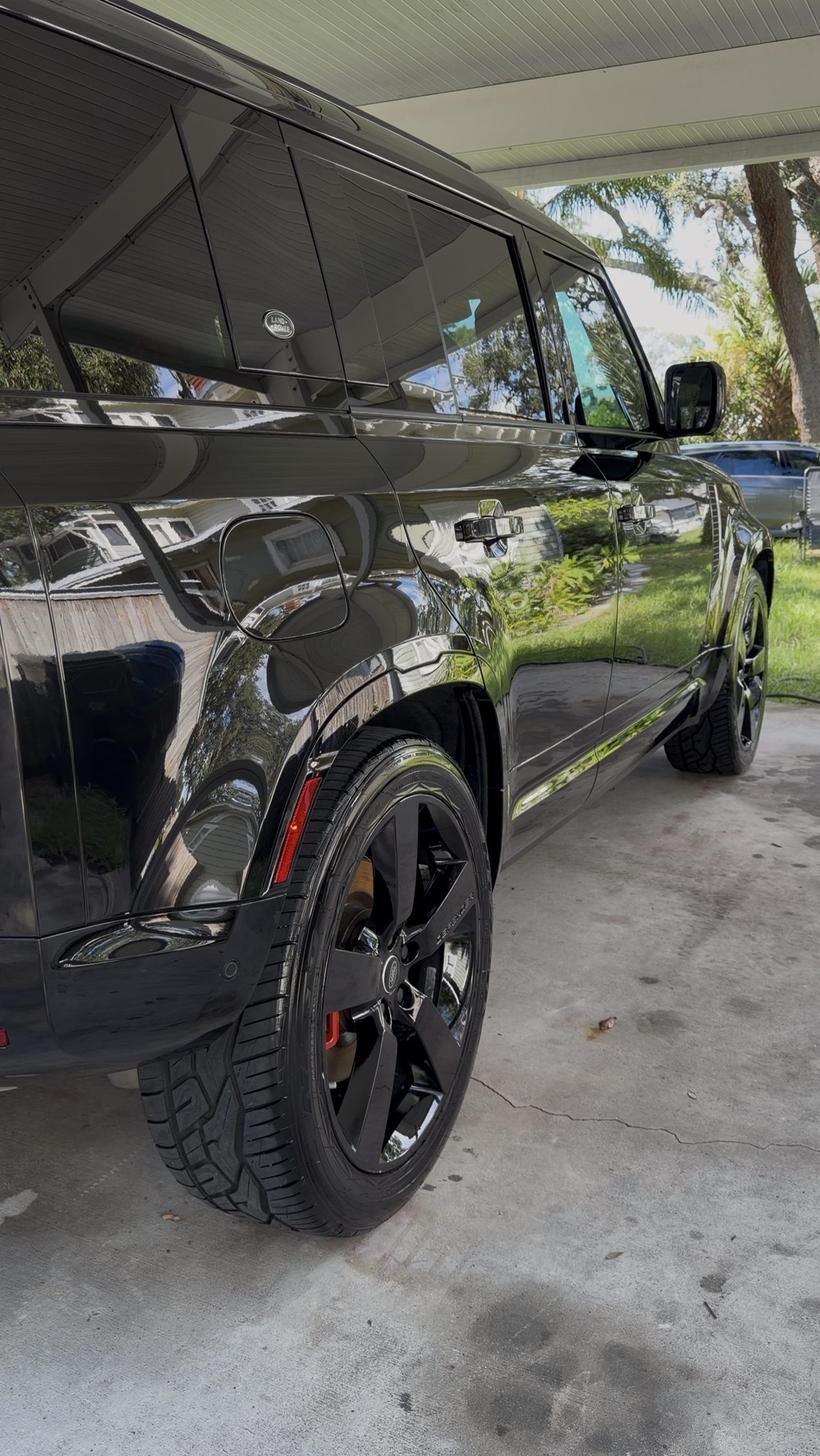 The same Land Rover Defender after detailing by Harn Detailing Co., with a deep, mirror-like finish