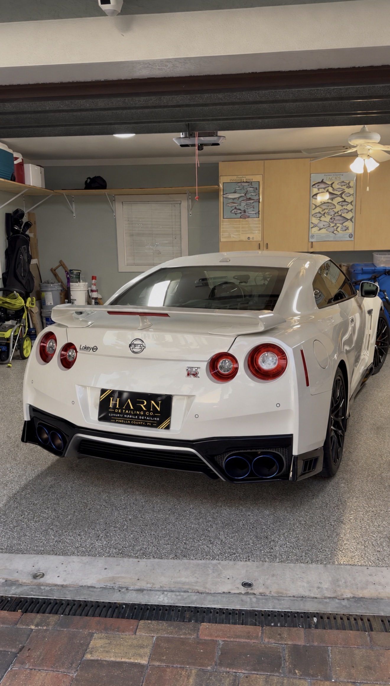 White Nissan GT-R with a glossy finish after a detail by Harn Detailing Co., Pinellas County